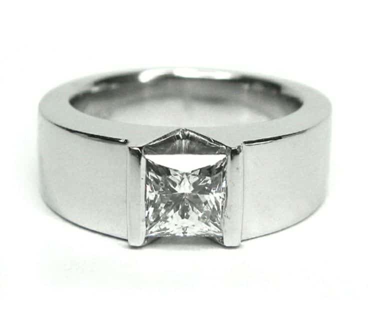 Modern style engagement ring with wide shank